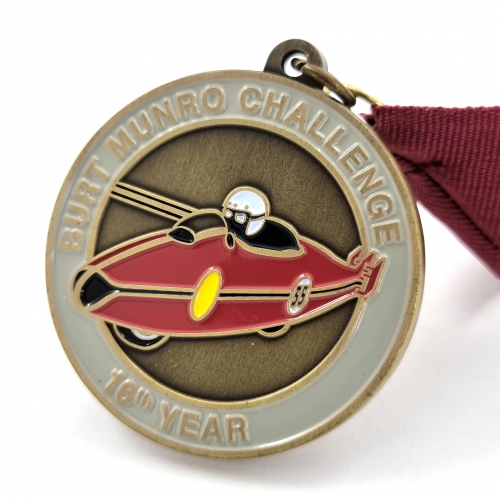 Burt Munro Challenge Medal 2022 – 56mm, Antique Brass Finish, 5+ Colour Enamel, V-neck Ribbon