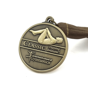 Christchurch School of Gymnastics Trampoline Gold Medal 2022 – 58mm, Antique Brass Finish, V-neck Ribbon