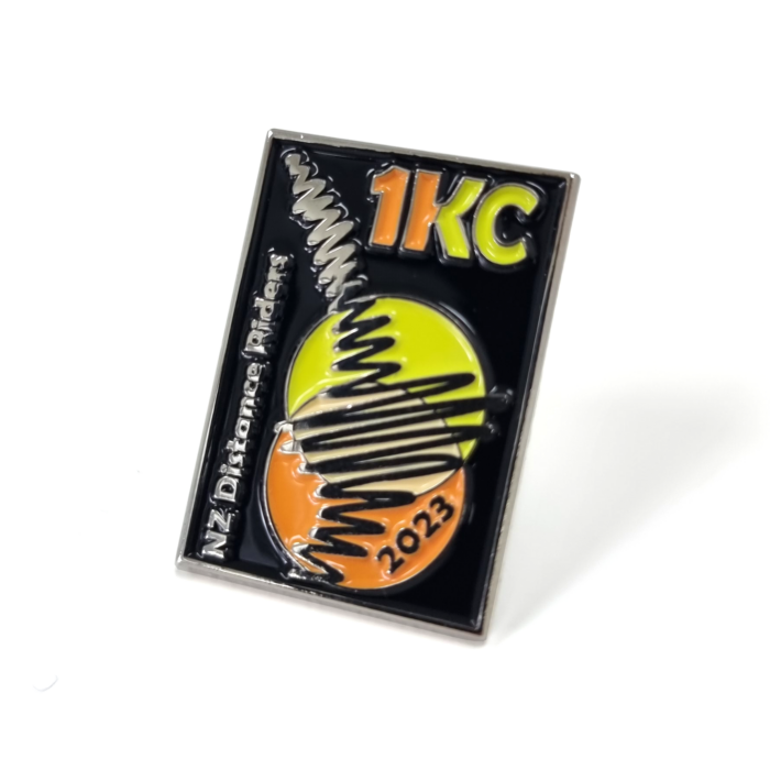 NZ Distance Riders 2023 1KC pin - 30mm, bright Nickel Finish, Three Colour Enamel, Brooch Fitting